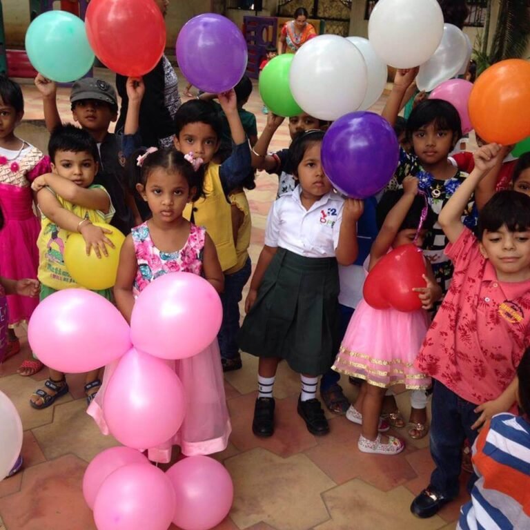 Students enjoying Balloon Day celebration at Lovedale International School, Hyderabad, Banjara Hills, with colorful balloons and festive activities.
