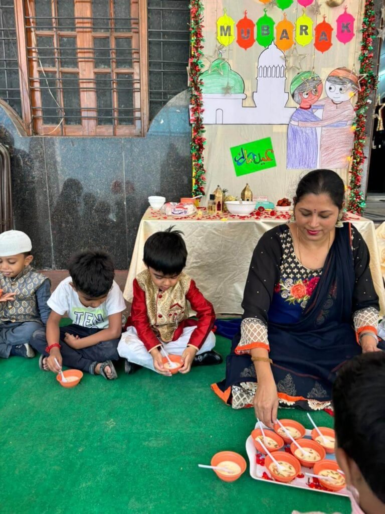 Teacher assisting Students on Eid Al Fitr at Lovedale International School, Hyderabad, Banjara Hills, spreading joy and unity during the festive season.