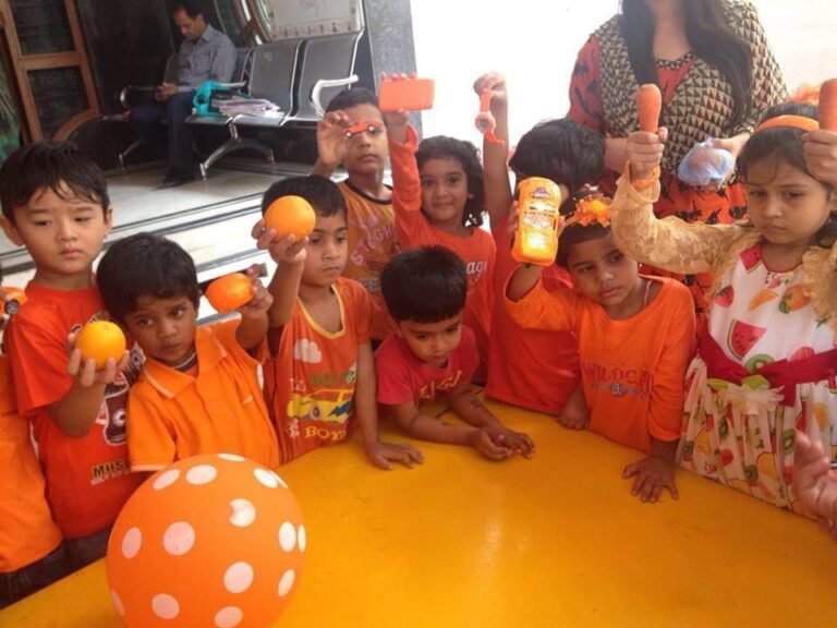 Students exploring the spectrum of orange hues on Orange Colour Day at Lovedale International School, Hyderabad, Banjara Hills, radiating joy and creativity.